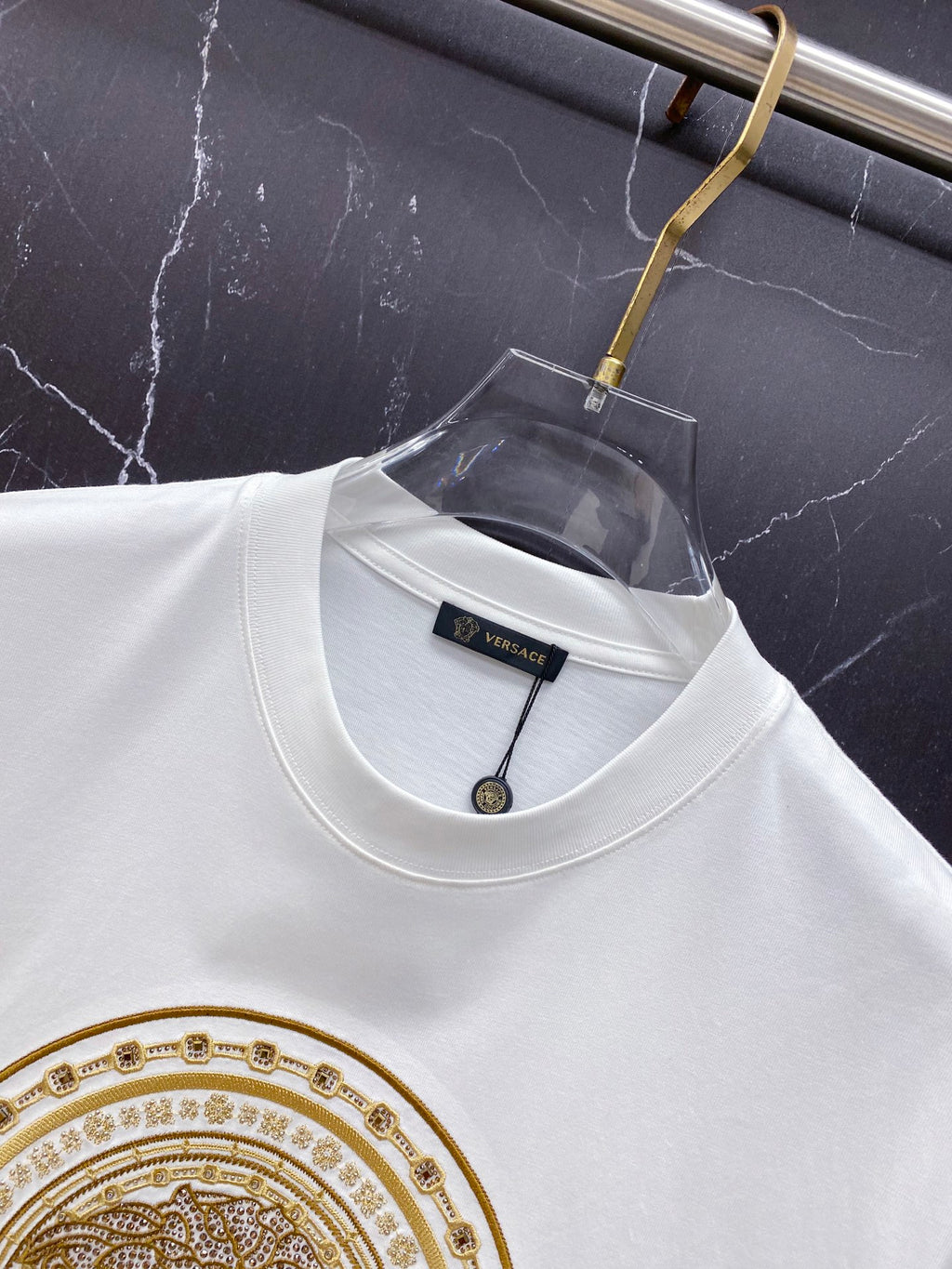 Versace white T-shirt collar with black neck label and gold medallion border