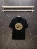 Versace black T-shirt with gold circular Medusa logo on chest