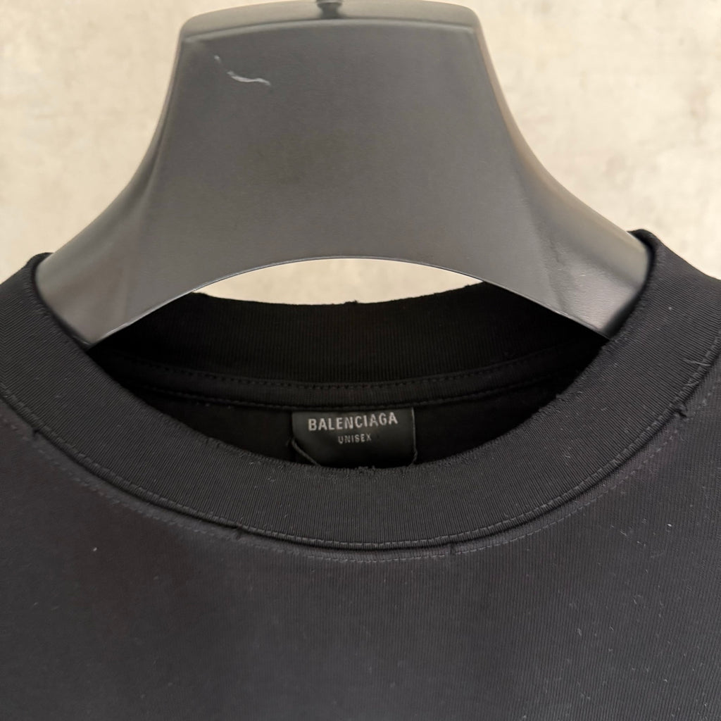 Black T-shirt neckline and inner neck label detail