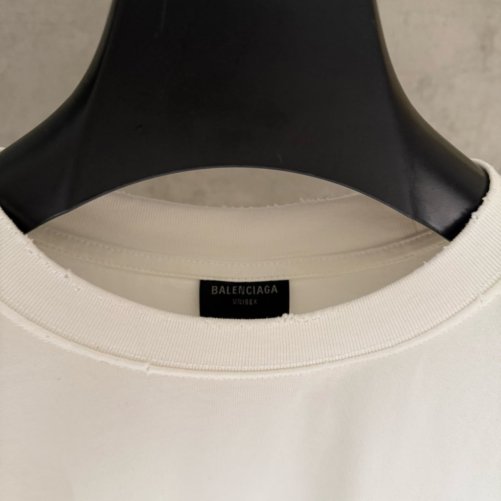 Balenciaga white T-shirt neckline close-up with inner neck label and ribbed collar