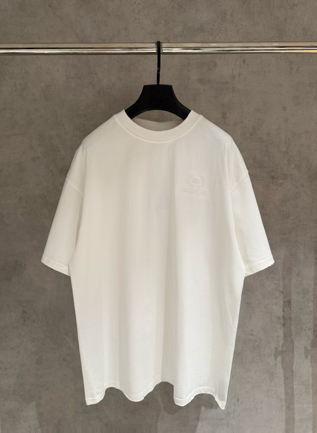 Balenciaga white T-shirt with crew neck and short sleeves on a hanger
