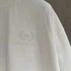 Balenciaga white T-shirt sleeve and chest logo detail, smooth jersey fabric