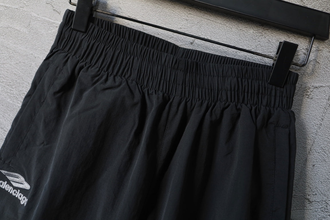 Black Balenciaga pants with ruched elastic waistband and pleated front