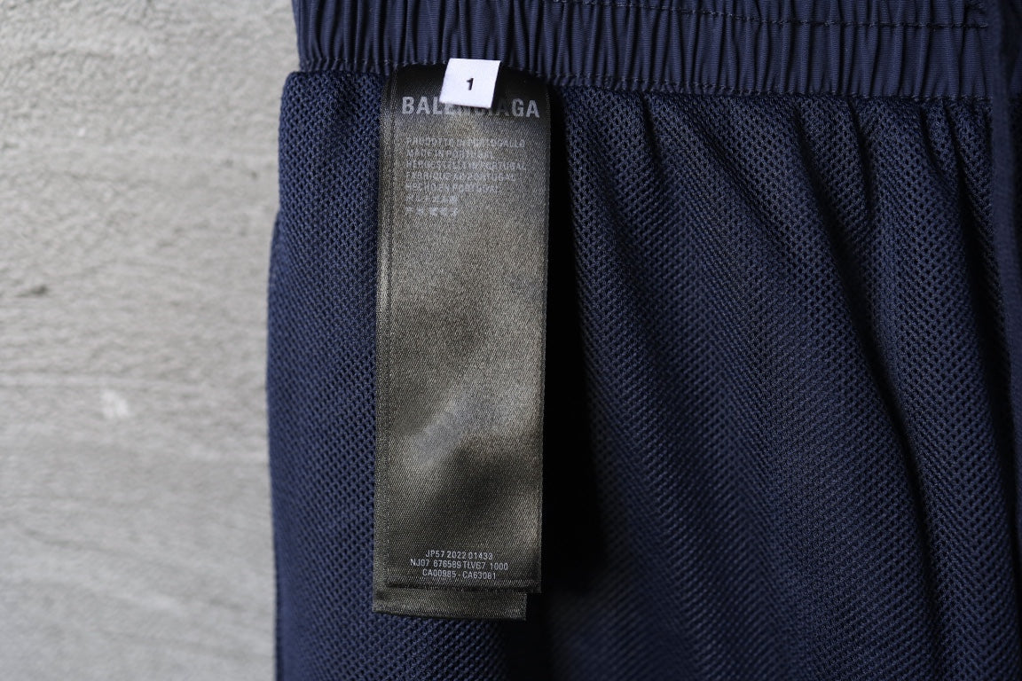 Navy pants with inner fabric tag near waistband