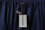 Navy Balenciaga pants with attached brand tag at waistband