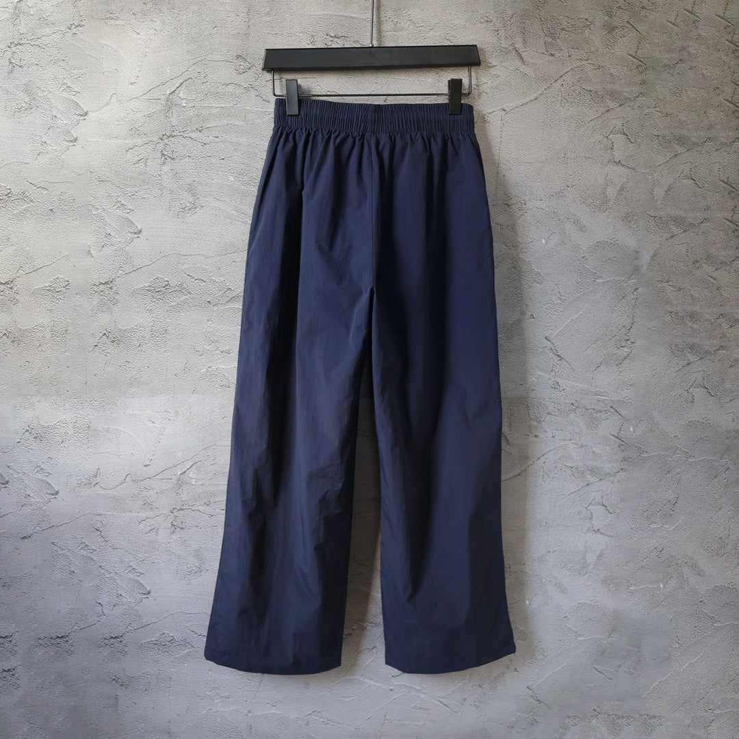 Balenciaga pants, dark navy wide-leg with elastic waist and pleated front