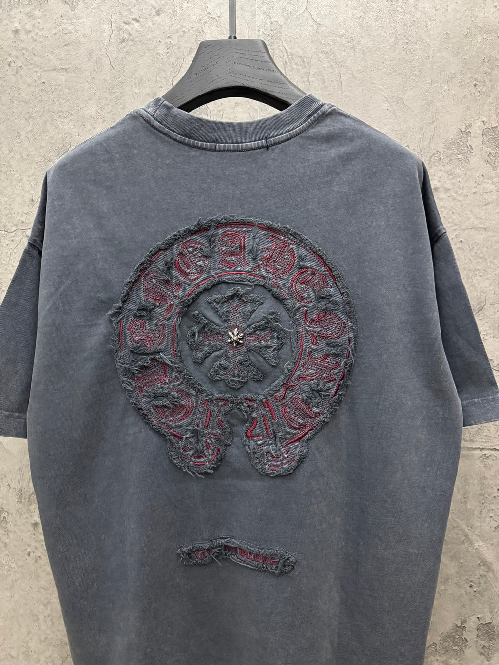Graphic short-sleeve T-shirt with large back circular embroidery and small back emblem