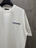 White short-sleeve T-shirt front view with small raised logo patch on the chest
