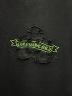 Black short-sleeve T-shirt close-up of raised green embroidered logo banner