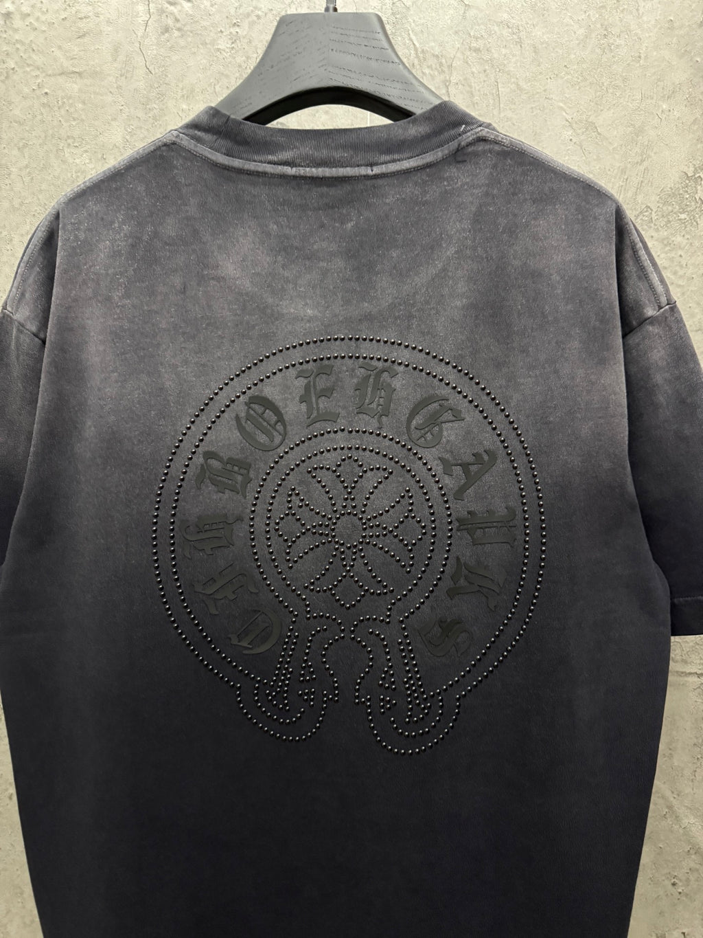 Dark gray short-sleeve T-shirt with large circular back rhinestone skull design