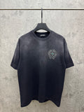 Dark short-sleeve T-shirt with small chest logo emblem on the left side