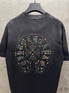 Dark short-sleeve T-shirt, back view, with large studded circular graphic