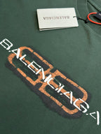 Balenciaga short-sleeve T-shirt close-up of orange logo lettering on chest