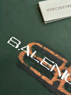 Balenciaga short-sleeve T-shirt logo detail with white and orange lettering