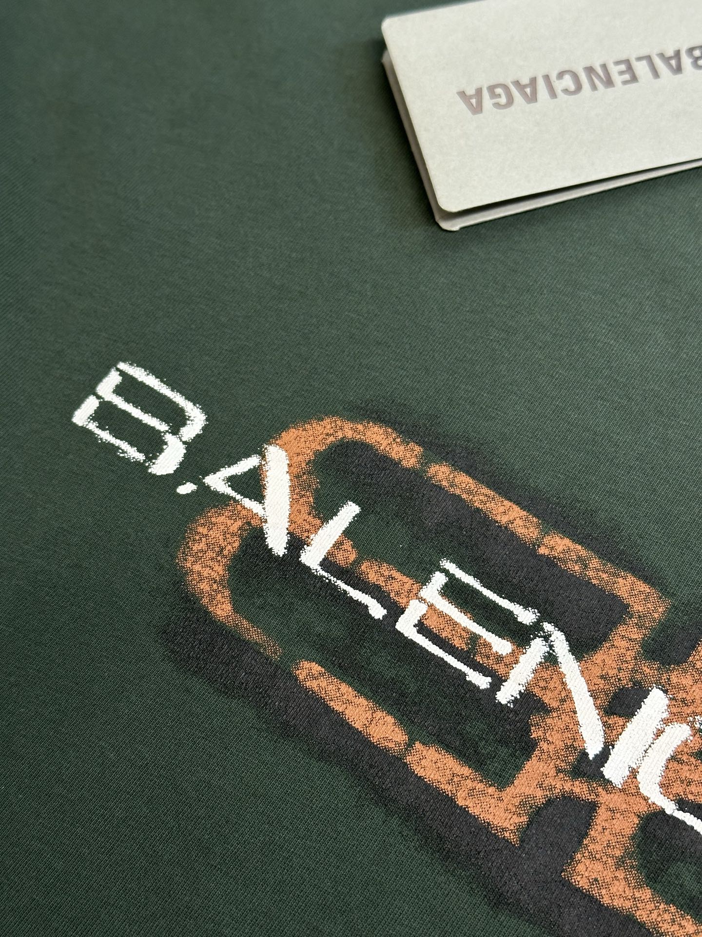 Balenciaga short-sleeve T-shirt logo detail with white and orange lettering