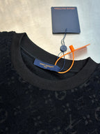 Dark crewneck short-sleeve T-shirt neckline with stitched brand label