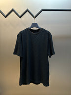 Dark navy short-sleeve crewneck T-shirt with subtle allover monogram pattern