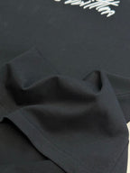 Louis Vuitton black T-shirt fabric panel with stitched edge detail