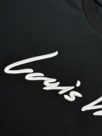 Louis Vuitton short-sleeve T-shirt logo, white cursive on black fabric