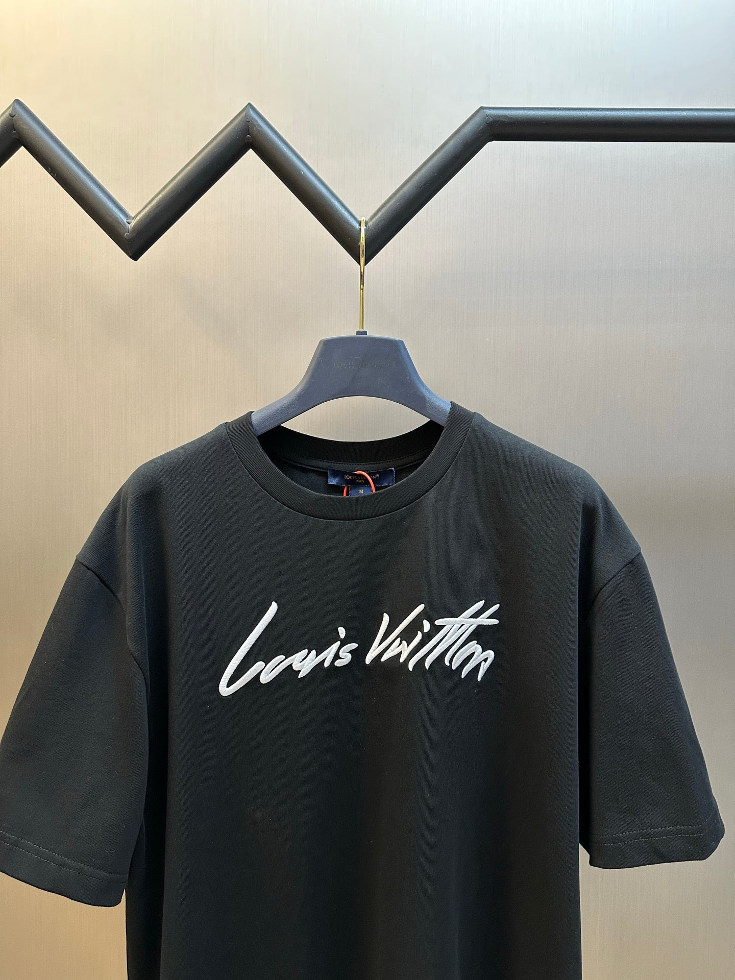 Louis Vuitton short-sleeve T-shirt, black, white cursive logo at chest