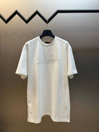 White short-sleeve T-shirt with Louis Vuitton script logo on chest