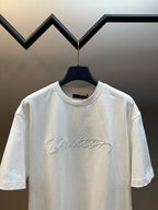 White short-sleeve T-shirt with Louis Vuitton script logo, crew neck