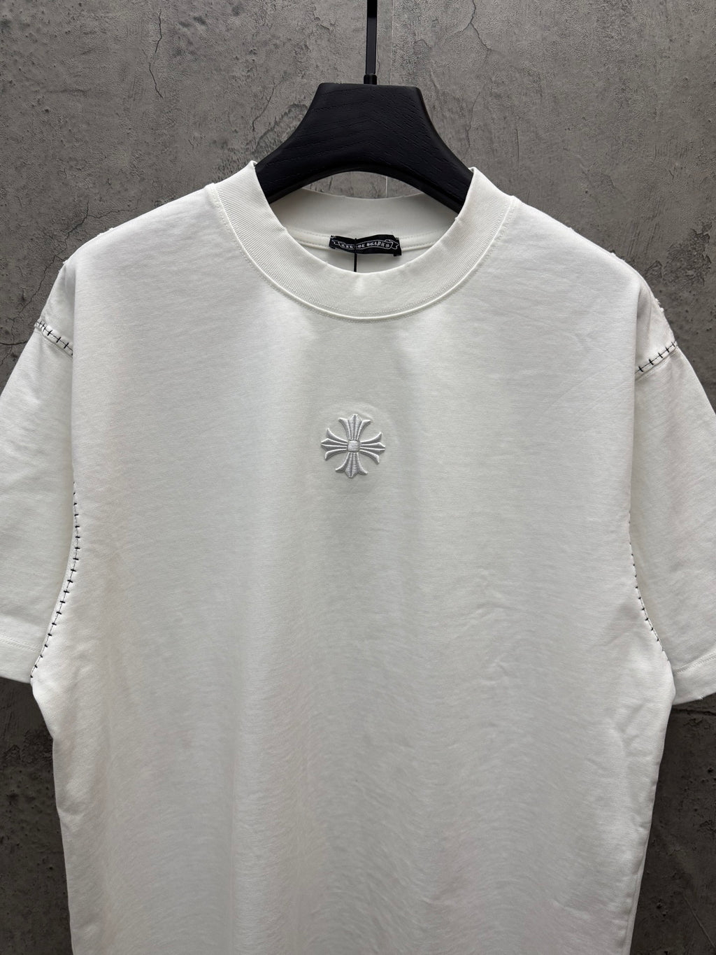 White short-sleeve T-shirt with centered chest embroidered emblem