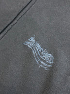 Dark gray fabric with small blue arched logo print