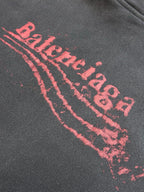 Dark gray hoodie with large red arched logo graphic
