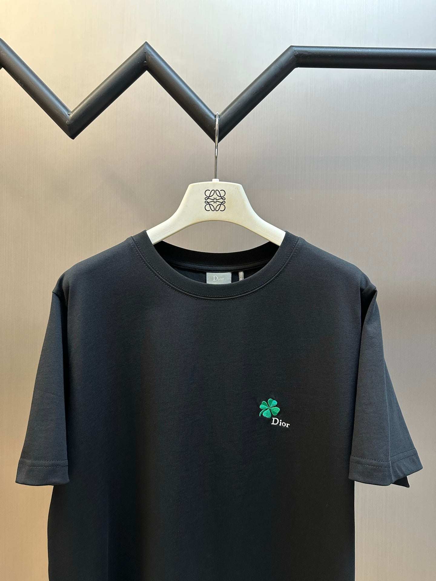 Dior black short-sleeve T-shirt, crew neck and chest logo, front view