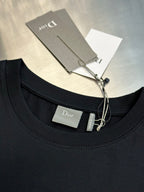 Dior black short-sleeve T-shirt neckline with inside tag and hanging label