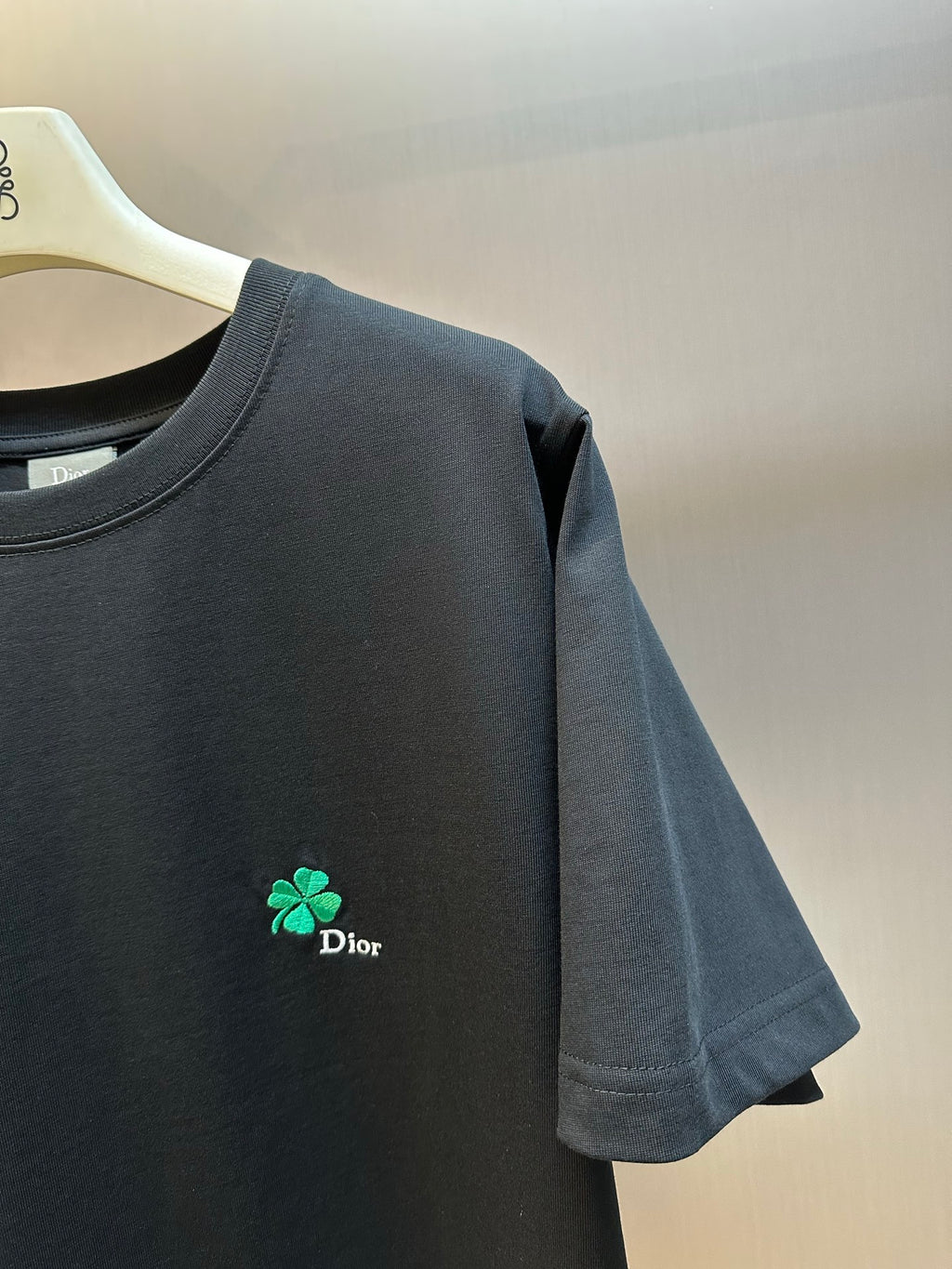 Dior black short-sleeve T-shirt, green clover logo on left chest