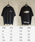 Two black short-sleeve T-shirts on hangers with Balenciaga logo prints