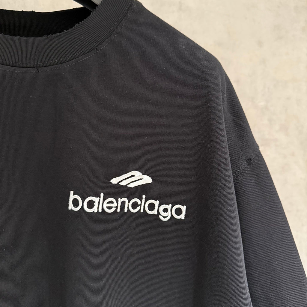 Black short-sleeve T-shirt with Balenciaga logo and small icon print