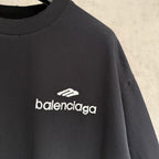 Black short-sleeve T-shirt with Balenciaga logo and small icon print