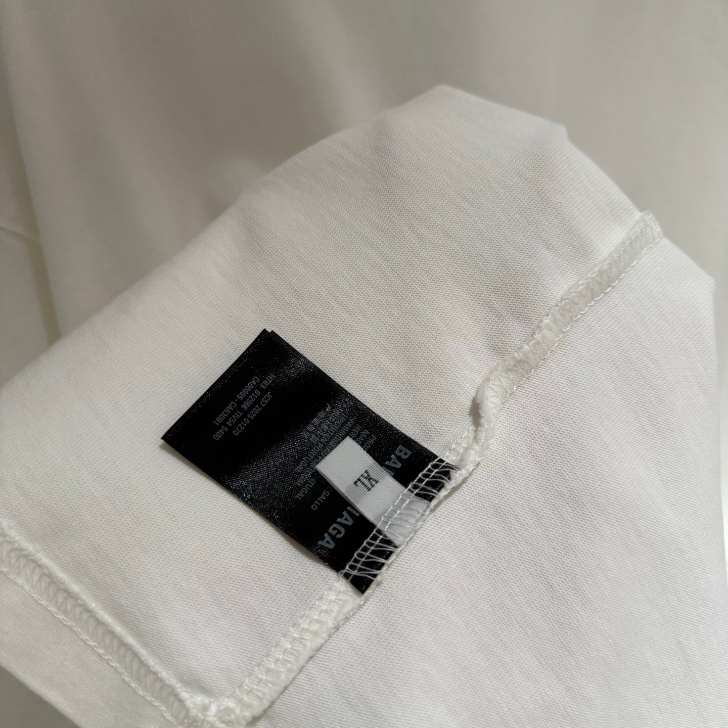 White Balenciaga T-shirt sleeve with care label patch