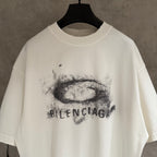 White Balenciaga T-shirt front close-up of lips and logo