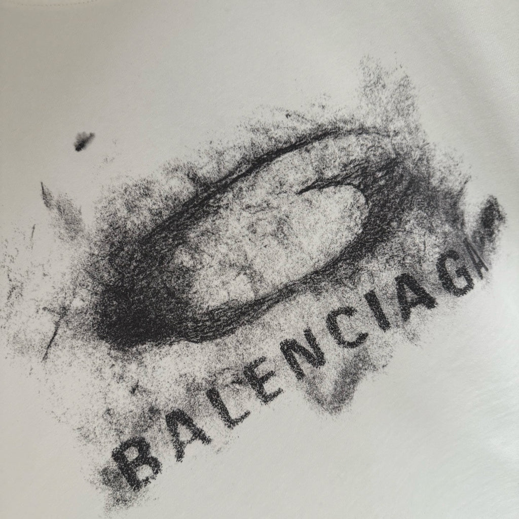 White Balenciaga T-shirt graphic close-up with BALENCIAGA text