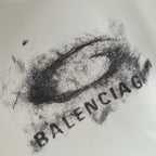 White Balenciaga T-shirt graphic close-up with BALENCIAGA text