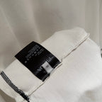 White Prada short-sleeve T-shirt with sleeve seam and care tag