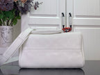 White leather handbag with wide front panel and long crossbody strap