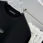 Black crew-neck T-shirt close-up, Alexander Wang inner label
