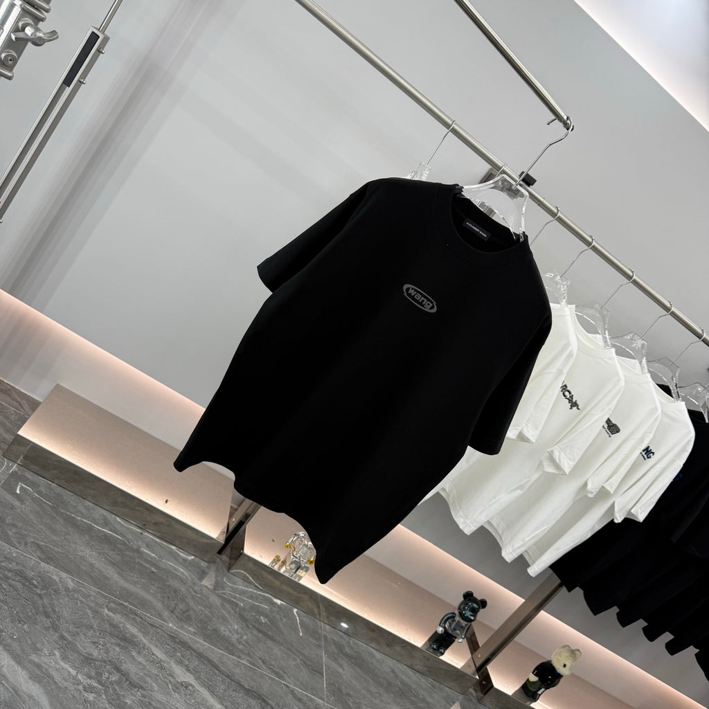 Black graphic T-shirt on hanger, short sleeves, wang logo