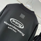 Black T-shirt close-up with large wang and alexanderwang text logo