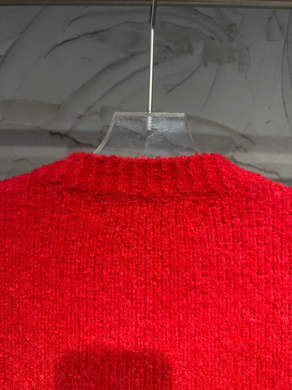 Red knit long jacket with ribbed trim and button front