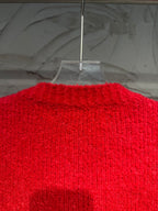 Red knit long jacket with ribbed trim and button front