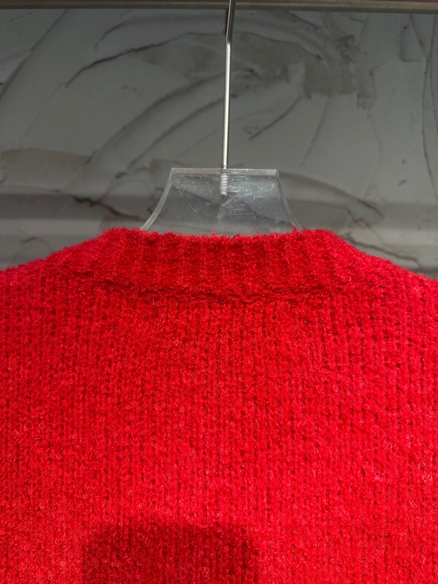 Red knit long jacket with ribbed trim and button front