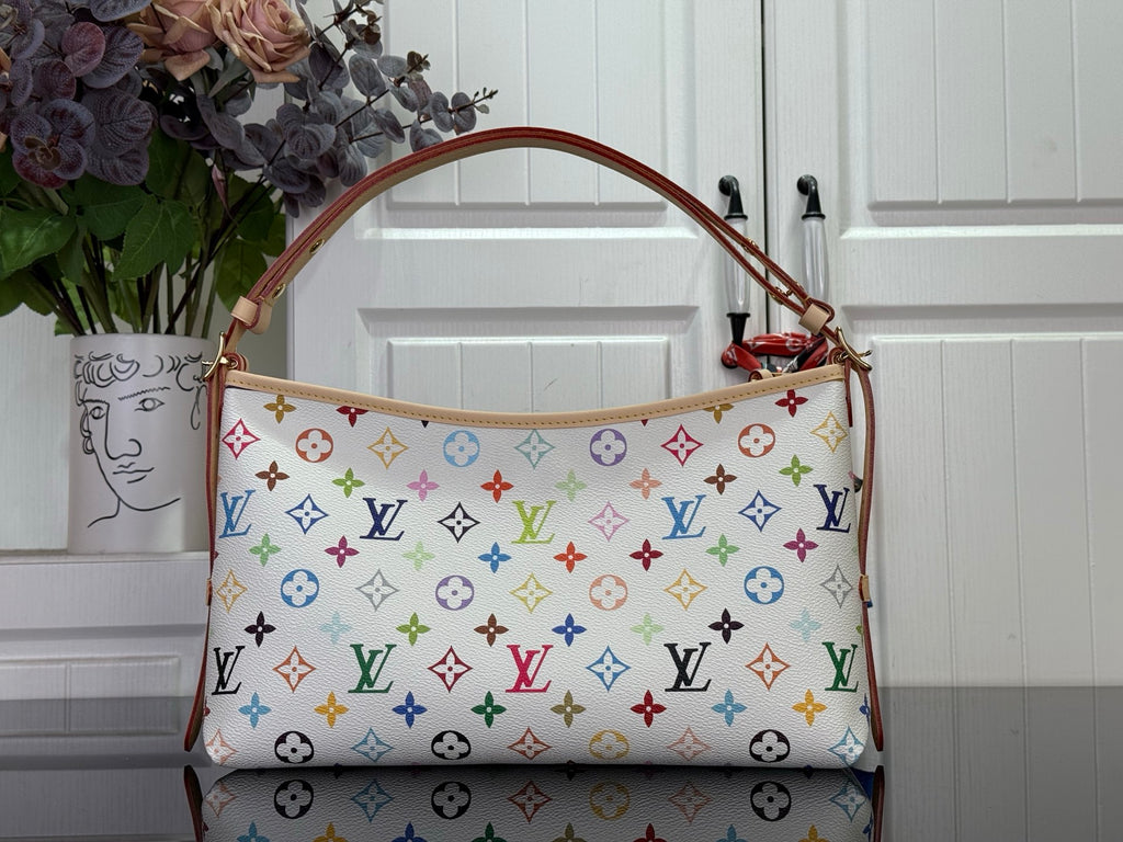 Multicolor logo handbag with brown leather top handles and patterned front panel