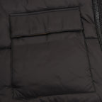 Black puffer jacket front pocket panel with stitched borders