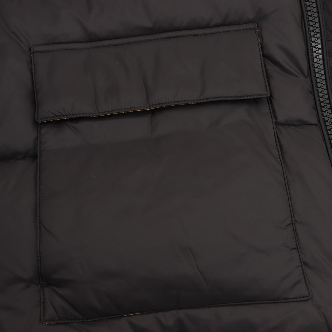Black puffer jacket front pocket panel with stitched borders